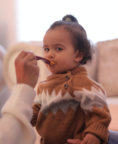 Gently run the back of a cold weaning spoon along your baby’s gums.